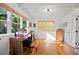 Cozy home office with hardwood floors, built-ins, and lots of natural light at 6255 Lakeview Dr, Buford, GA 30518