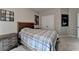 Neutral bedroom featuring gray walls, plush carpet, large window, and wall art at 11210 Easthaven Pl, Duluth, GA 30097