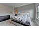Neutral bedroom featuring gray walls, plush carpet, and illuminated headboard at 11210 Easthaven Pl, Duluth, GA 30097