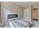 Inviting bedroom with soft carpeting, a neutral color scheme, and ample closet space for storage at 11210 Easthaven Pl, Duluth, GA 30097