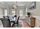 Dining area boasting hardwood floors, natural light, and elegant decor at 11210 Easthaven Pl, Duluth, GA 30097