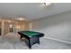 Game room with pool table, grey walls and carpet. Perfect for entertaining guests! at 11210 Easthaven Pl, Duluth, GA 30097