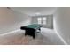 Game room with pool table, grey walls and carpet. Perfect for entertaining guests! at 11210 Easthaven Pl, Duluth, GA 30097