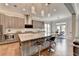Open kitchen boasts a large island with barstool seating and stainless steel appliances at 11210 Easthaven Pl, Duluth, GA 30097