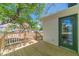 Wooden back deck with a railing, providing a cozy outdoor space at 181 W Hightower Trl, Social Circle, GA 30025