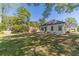 Expansive backyard featuring a well-maintained lawn and lush landscaping at 181 W Hightower Trl, Social Circle, GA 30025