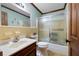 Bathroom featuring a vanity with sink, toilet, tiled shower, and framed mirror at 3141 Burnt Hickory Nw Rd, Marietta, GA 30064