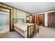 Bright bedroom with wood trim, access to en-suite bathroom and closet at 3141 Burnt Hickory Nw Rd, Marietta, GA 30064