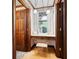 Vanity area with a window and wooden doors, and a chair with carpet flooring at 3141 Burnt Hickory Nw Rd, Marietta, GA 30064