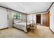 Bedroom featuring a bed, wood trim, carpet flooring and natural light at 3141 Burnt Hickory Nw Rd, Marietta, GA 30064