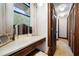 Bedroom with a vanity area, wood trim and carpet flooring at 3141 Burnt Hickory Nw Rd, Marietta, GA 30064