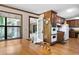 Kitchen dining area with bright windows, hardwood floors and wooden kitchen cabinets adjacent to the eating area at 3141 Burnt Hickory Nw Rd, Marietta, GA 30064