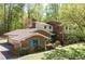 Brick two-story home with a well-manicured lawn and unique architectural details at 3141 Burnt Hickory Nw Rd, Marietta, GA 30064