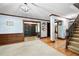 Spacious foyer with hardwood floors, elegant stairway, and intricate wall details at 3141 Burnt Hickory Nw Rd, Marietta, GA 30064