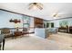 Comfortable living room with a brick fireplace, two ceiling fans, light blue walls, and neutral carpet at 3141 Burnt Hickory Nw Rd, Marietta, GA 30064