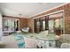 Outdoor patio has brick siding, furniture and provides plenty of seating at 3141 Burnt Hickory Nw Rd, Marietta, GA 30064