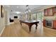 Finished basement featuring a game room, kitchenette, and lots of space to entertain at 3870 Cabalzar St, Cumming, GA 30040