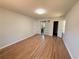 Bright bedroom featuring hardwood floors, closet with sliding door, and ensuite bath at 563 Hillandale Circle Sw, Marietta, GA 30064