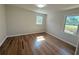 Bright bedroom with hardwood floors and natural light streaming through the windows at 563 Hillandale Circle Sw, Marietta, GA 30064