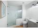 Modern bathroom featuring a glass-enclosed shower, toilet, and vanity at 648 Gold Valley Pass, Canton, GA 30114