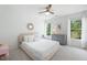 Cozy bedroom with light decor, natural light and plush carpet, a tranquil space at 648 Gold Valley Pass, Canton, GA 30114