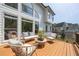 Outdoor deck with comfortable seating and view of the backyard at 648 Gold Valley Pass, Canton, GA 30114