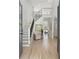 Expansive foyer featuring a staircase, hardwood floors, and views to other rooms at 648 Gold Valley Pass, Canton, GA 30114