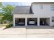 Three car garage with multiple vehicles and great storage space at 648 Gold Valley Pass, Canton, GA 30114
