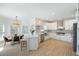 Spacious kitchen with a center island, stainless appliances, eat in kitchen area, and hardwood floors at 648 Gold Valley Pass, Canton, GA 30114