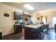 Spacious kitchen with stainless appliances, stone countertops, and seating at the island at 7779 Haynes Park Cir, Lithonia, GA 30038