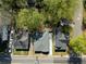 Aerial view showing roof and driveways of this home in a charming neighborhood with mature trees and sidewalk at 1515 Jonesboro Rd, Atlanta, GA 30315