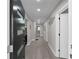 Hallway features light gray walls, modern lighting, and stylish interior doors and hardware at 1515 Jonesboro Rd, Atlanta, GA 30315