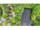 Overhead view of the home situated close to the lake, surrounded by lush trees at 226 Sandra Nw Dr, Lilburn, GA 30047