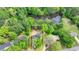 Aerial view of home and property with a large body of water bordering the backyard at 226 Sandra Nw Dr, Lilburn, GA 30047