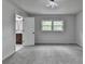 Bedroom with new carpet and view to ensuite bathroom at 226 Sandra Nw Dr, Lilburn, GA 30047