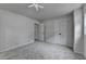 Bedroom with neutral walls, carpet and closet for plenty of storage at 226 Sandra Nw Dr, Lilburn, GA 30047