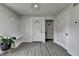 Inviting entryway featuring stylish flooring, a charming bench with hooks, and a well-lit, welcoming atmosphere at 226 Sandra Nw Dr, Lilburn, GA 30047