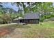 Charming home featuring a two-car garage and complemented by landscaping, offering both convenience and curb appeal at 226 Sandra Nw Dr, Lilburn, GA 30047