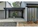 A lovely front porch and entrance featuring stylish decor and a welcoming ambiance at 226 Sandra Nw Dr, Lilburn, GA 30047