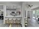 Kitchen view with breakfast bar seating, modern pendant lighting, and stainless steel appliances at 226 Sandra Nw Dr, Lilburn, GA 30047