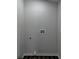 Bright laundry room with washer and dryer hookups at 226 Sandra Nw Dr, Lilburn, GA 30047