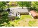 Aerial view of home with carport, large yard, and inviting outdoor spaces at 3224 Laura Way, Winston, GA 30187
