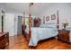 Spacious bedroom featuring hardwood floors and a four poster bed at 3224 Laura Way, Winston, GA 30187