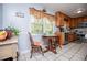 Eat-in kitchen features natural light and views of the landscaped yard at 3224 Laura Way, Winston, GA 30187