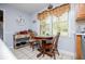 Eat-in kitchen with natural light, neutral walls, and views of the backyard at 3224 Laura Way, Winston, GA 30187