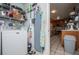 Organized laundry area conveniently located near the kitchen with storage and appliances at 3224 Laura Way, Winston, GA 30187