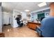 Well-lit office space with two desks, hardwood floors, neutral paint, and a rolling office chair at 3224 Laura Way, Winston, GA 30187