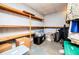 Unfinished basement storage area with exposed shelving and ample room for organizing belongings at 3224 Laura Way, Winston, GA 30187