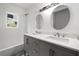 Stylish bathroom with double sinks, modern fixtures, and a tub/shower combo at 3460 Old Fairburn Rd, South Fulton, GA 30349