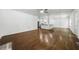 Bright living room with hardwood floors and recessed lights open to the kitchen at 3460 Old Fairburn Rd, South Fulton, GA 30349